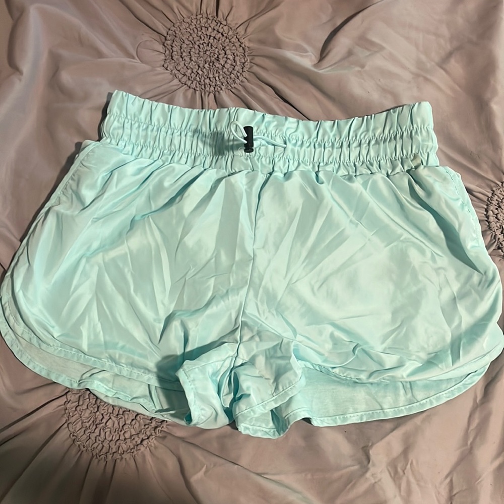mint green shorts
